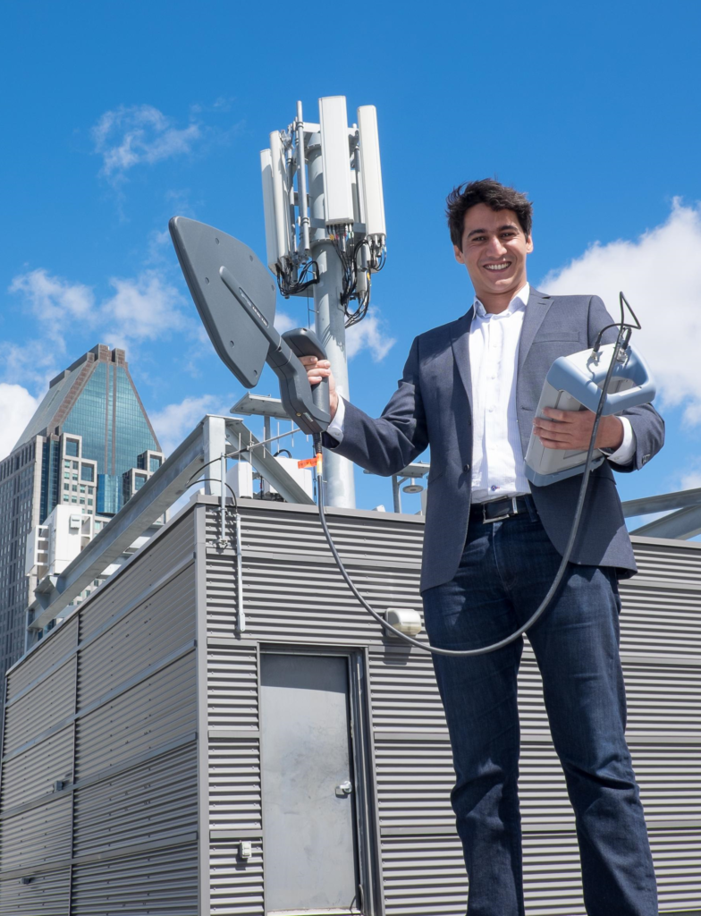 Sofiane Bounaffaa holding state-of-the-art wireless communication solution