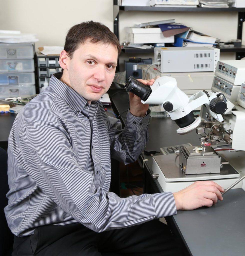 Photo of Dr. Leonid Belostotski working in a lab