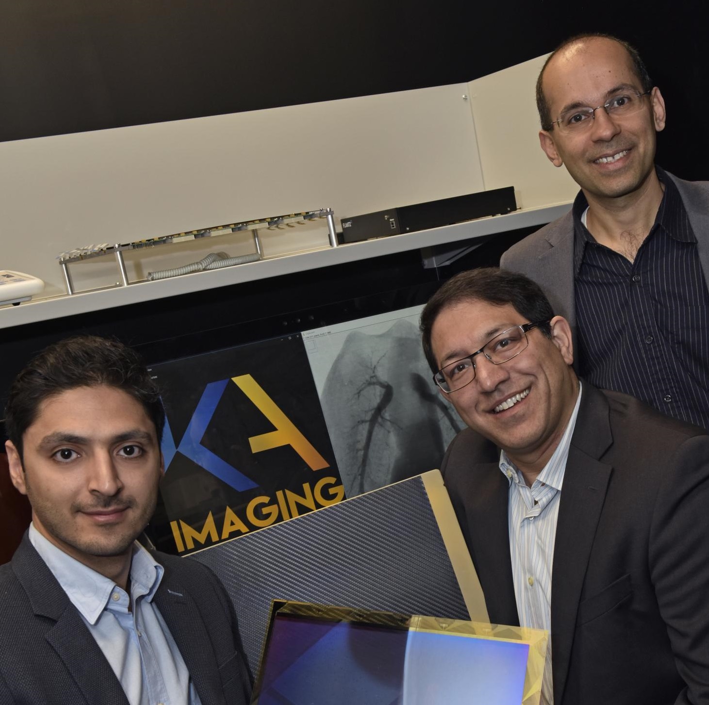 Photo of University of Waterloo innovator Karim Karim (far right) and his team