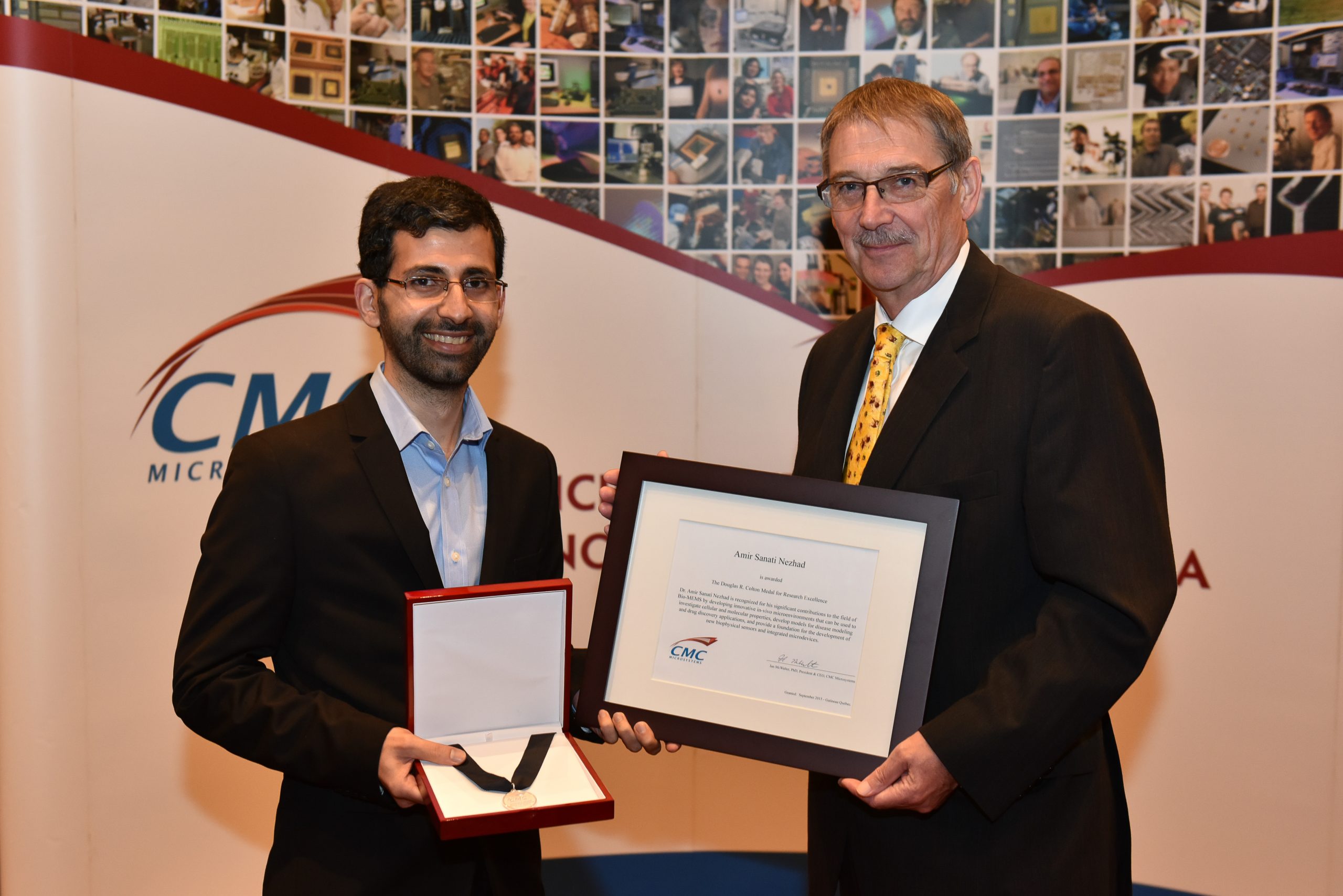 Dr. Amir Sanati-Nezhad & Dr. Ian McWalter holding Colton certificate and medal.