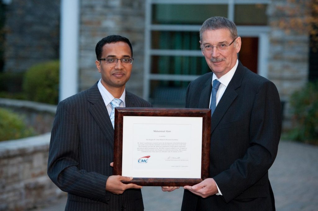 Dr. Muhammad Alam & Dr. Ian McWalter holding Colton certificate