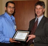 2005-Bahreyni-Microsys Behraad Bahreyni accepts his award from Chris Lumb.