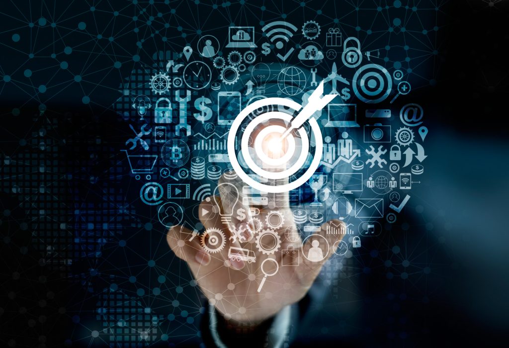 Digital marketing. Businessman touching darts aiming at the target center with icon network connection. Business goal and technology concept Digital marketing. Businessman touching darts aiming at the target center with icon network connection. Business goal and technology concept